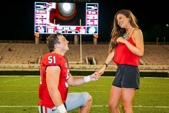 Jake's Proposal to Peyton After the Game by Blane Marable Photog