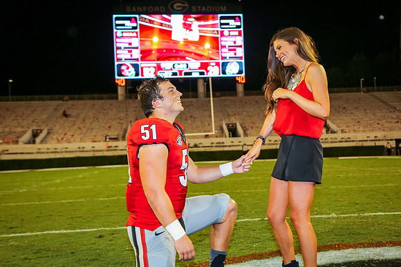 Jake's Proposal to Peyton After the Game by Blane Marable Photog