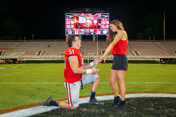 Jake's Proposal to Peyton After the Game by Blane Marable Photog